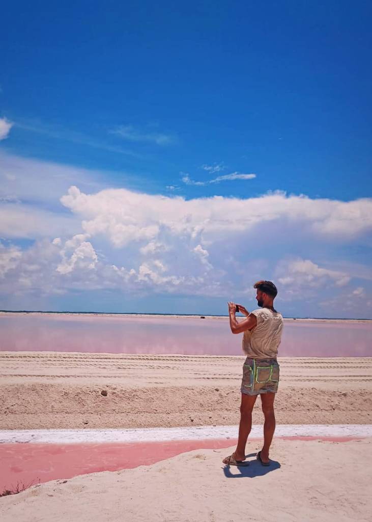 ATV Excursion Las Coloradas Yucatan Salt Flats Pink Water with Pink Flamencos, with EMf RMF Protection armor shorts with neon reflective accents. Holistic Retreats Rivera Maya.